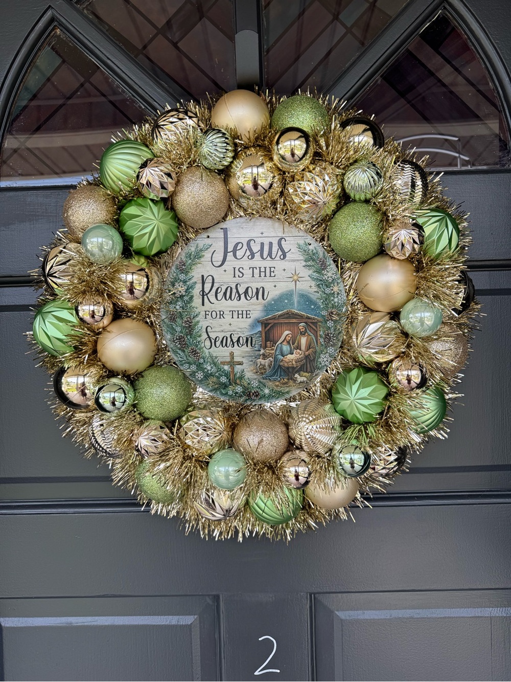Green and Gold Christmas Wreath with Nativity Centerpiece